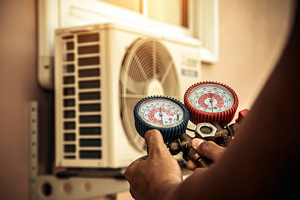 Professional Hvac technician working in Fort Bragg, NC